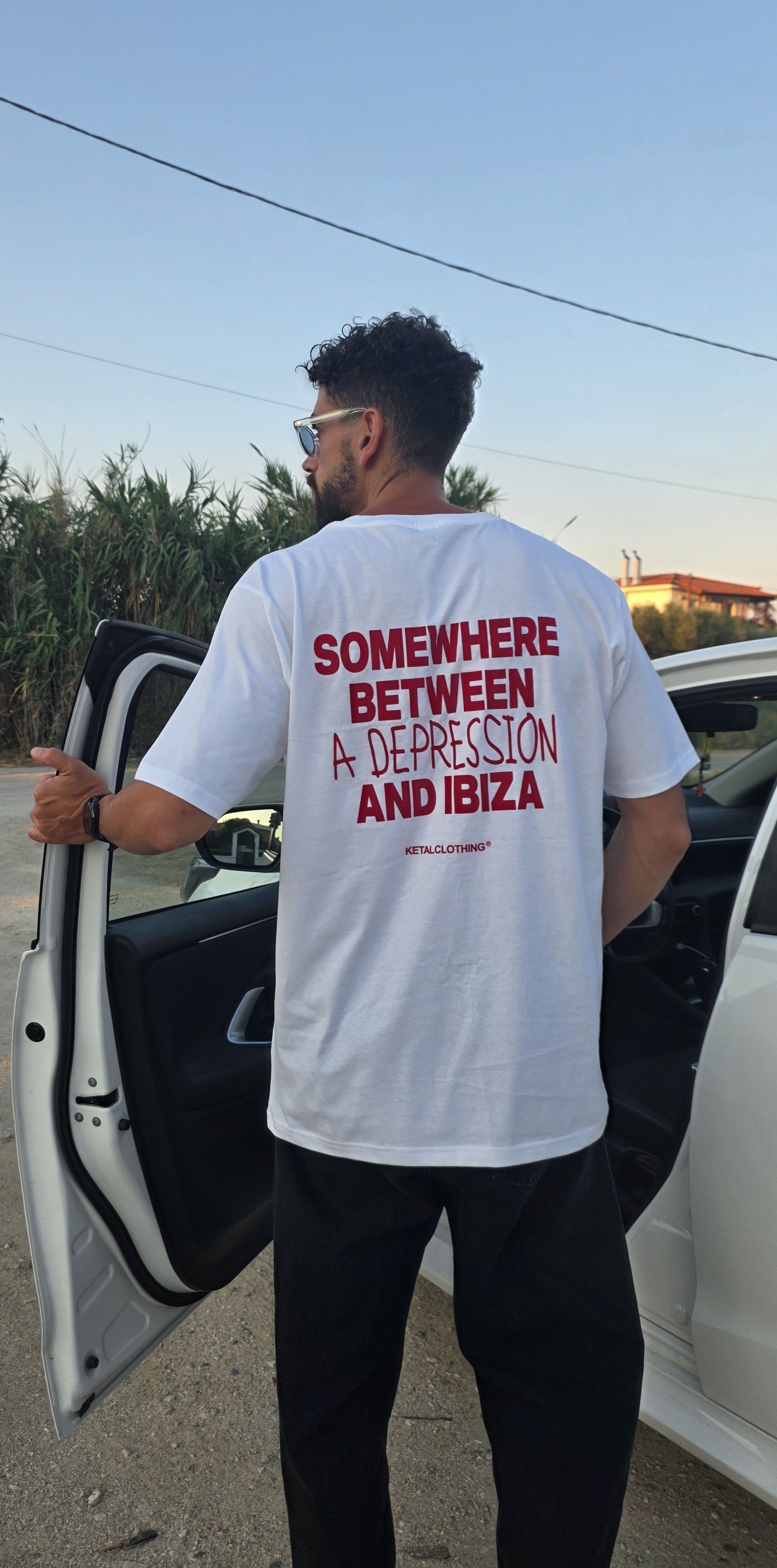 "SOMEWHERE BETWEEN A DEPRESSION AND IBIZA" TEE